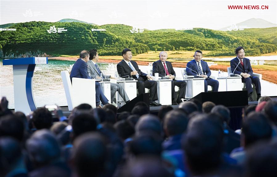 Chinese President Xi Jinping (3rd L, rear) attends the plenary session of the fourth Eastern Economic Forum (EEF), together with Russian President Vladimir Putin, Mongolian President Khaltmaa Battulga, Japanese Prime Minister Shinzo Abe and South Korean Prime Minister Lee Nak-yon, in Vladivostok in Russia's Far East, on Sept. 12, 2018. (Xinhua/Huang Jingwen)